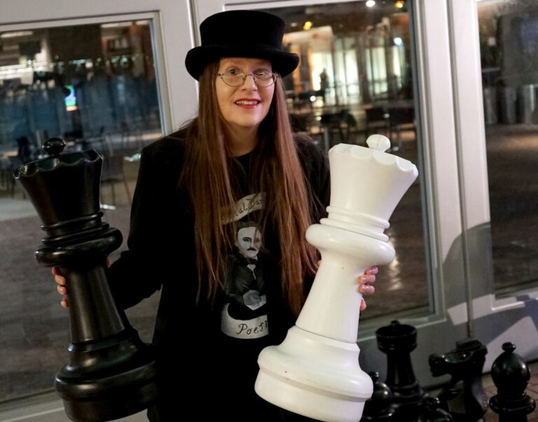 Quirky Author Lori R. Lopez Plays Chess at 54th San Diego Local Authors Exhibit