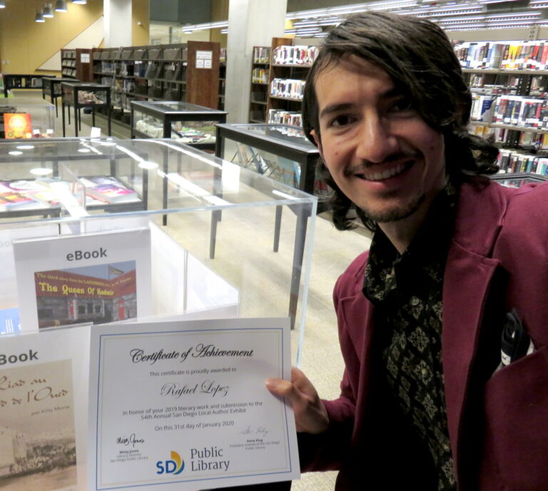 Rafael Lopez Poses at 54th San Diego Local Authors Exhibit