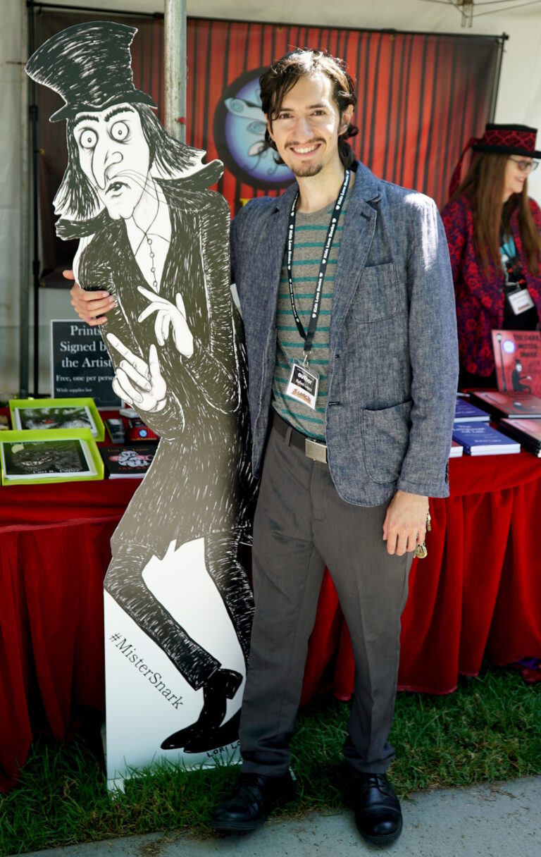 2018 O.C. Children's Book Festival - Rafael Lopez Posing With Mister Snark Cutout