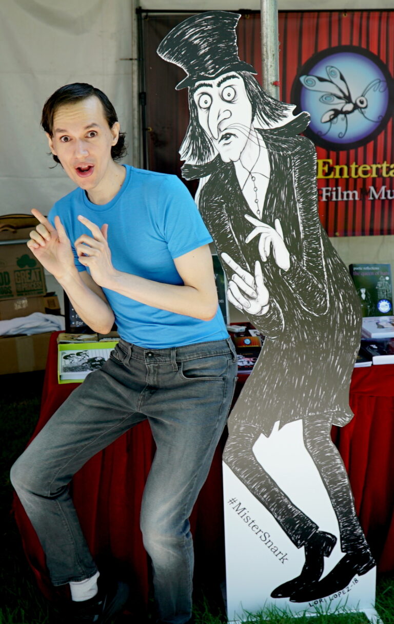2018 O.C. Children's Book Festival - Noel Lopez Posing With Mister Snark Cutout