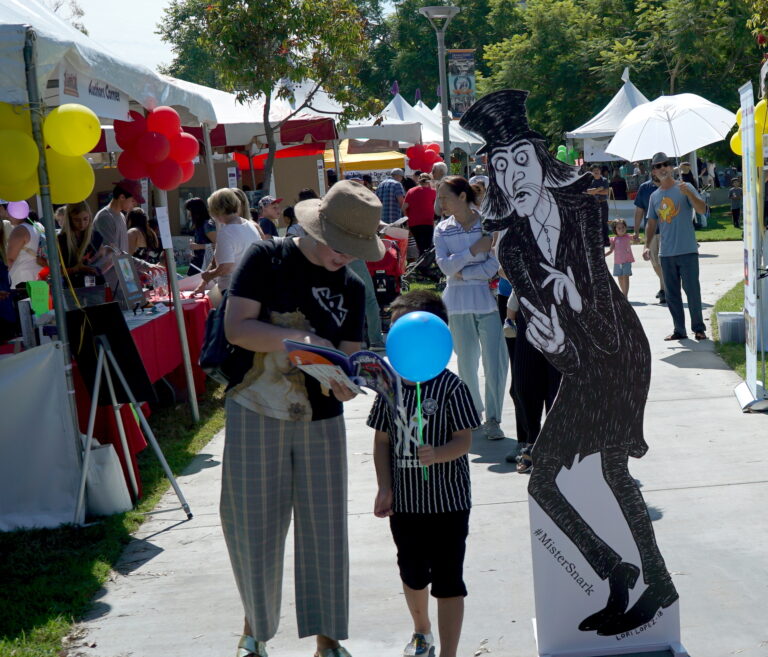 2018 O.C. Children's Book Festival - Mister Snark Next to Blue Balloon