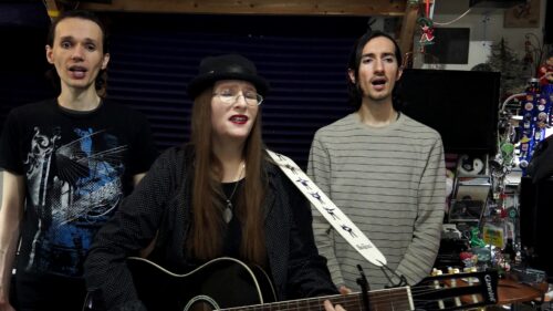 The Fairyflies band - Noel Lopez, Lori R. Lopez, Rafael Lopez singing The World Is One Family