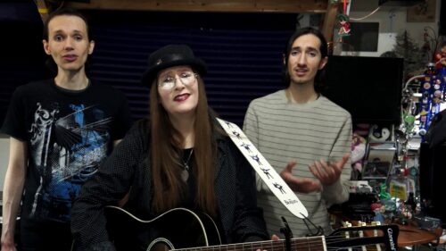 The Fairyflies band - Noel Lopez, Lori R. Lopez, Rafael Lopez singing The World Is One Family