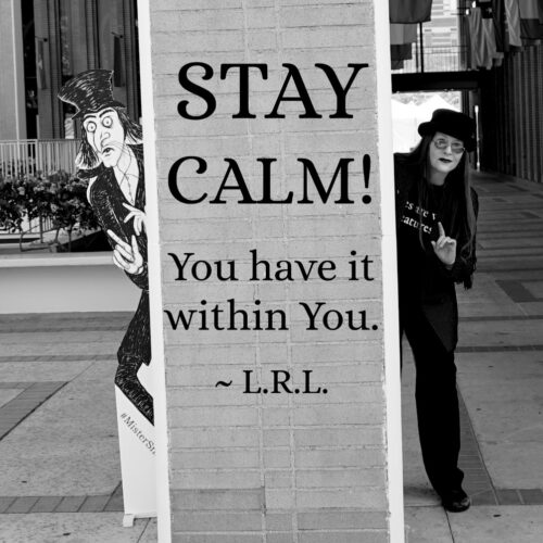 Author Lori R. Lopez posing with Mister Snark